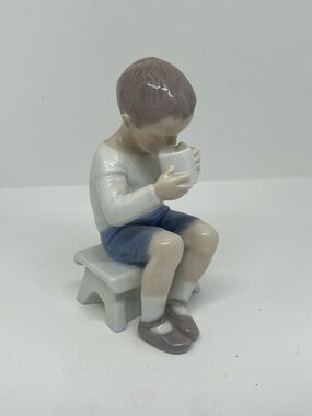 Royal Copenhagen “Boy Drinking Cup of Milk “ #1713